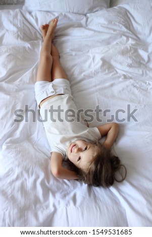 Similar – kid girl relaxing at home in weekend morning