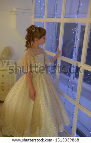 Cute Girl Princess In Alabaster Victorian Dress By The Window
