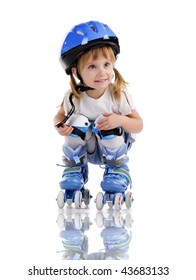 Cute girl in roller skates on a white background