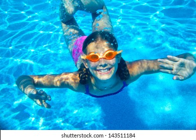 Cute Girl Swimming Underwater Smiling Stock Photo (Edit Now) 143511184