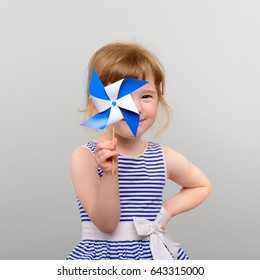 Cute Girl With Windmill Toy