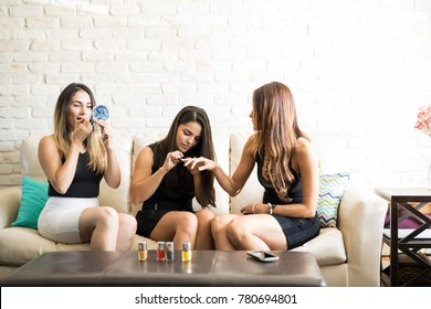 Cute Group Of Women All Dressed Up And Getting Ready For A Girls Night Out