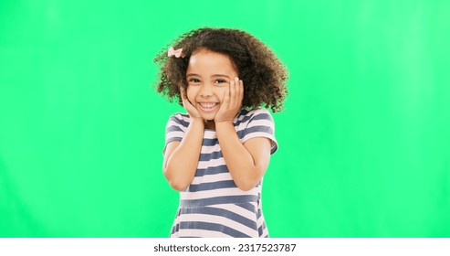 Cute, happy and the face of a child on a green screen isolated on a studio background. Smile, laughing and portrait of an adorable little girl looking cheerful, playful and expressing happiness - Powered by Shutterstock