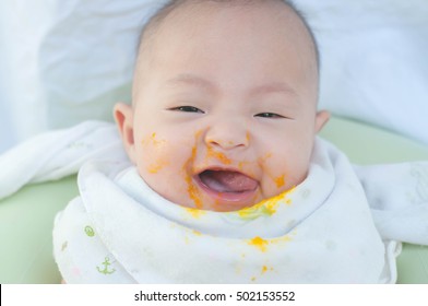 Cute Happy Smiling Asian Baby Infant Feeding