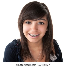 Cute Hispanic Teenage Girl Smiling With Braces On A White Background