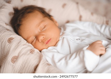 Cute infant baby boy 1-2 months old sleeping in nest with eyes closed close up. Childhood.  - Powered by Shutterstock