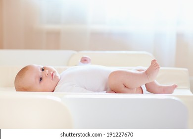 Cute Infant Baby On Changing Table