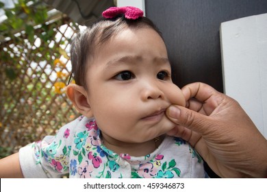 Cute Infant Being Pinch At The Chick 