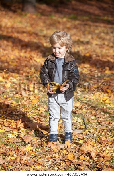 Cute Kid Blonde Hair Playing Yellow Stock Photo Edit Now 469353434