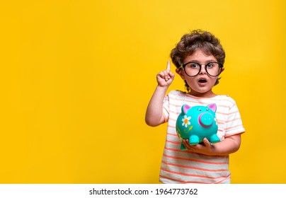 Cute Kid Girl Holding Dollars And Have An Idea How Earning Much Money In Crisis. Serious Child Teaching In Eyeglasses. Vintage Closeup Portrait.