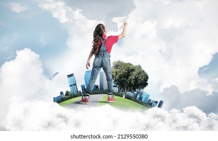 Cute Kid Girl On City Floating Island Throwing Paper Plane