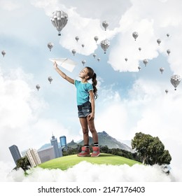 Cute Kid Girl On City Floating Island Throwing Paper Plane