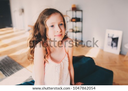 Image, Stock Photo cute kid girl relaxing at home in cozy weekend morning