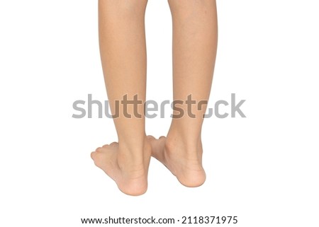 Cute kid leg, fast growing foot, isolated on white background.