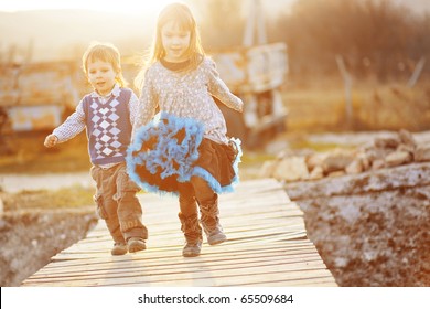 Cute Kids Resting At Countryside