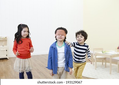 Cute Korean Kids Playing Tag 