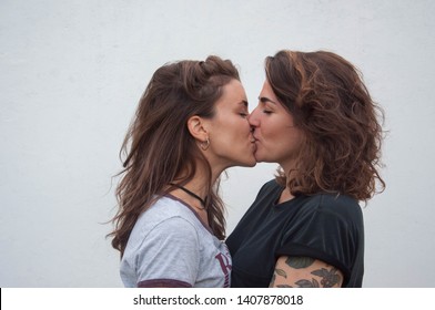 Cute Lesbian Couple Romantic Kiss. 