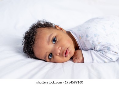 Cute Little African American Baby In Crib, Portrait