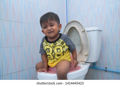 child using the toilet