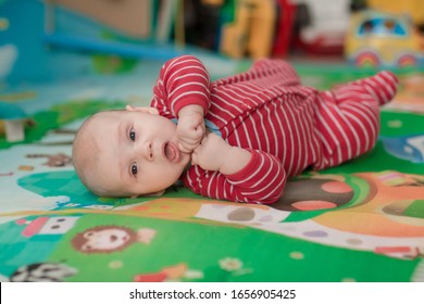 Cute Little Baby Boy Trying To Roll On Belly And Crawling