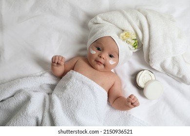 Cute Little Baby With Cream On Face, Top View