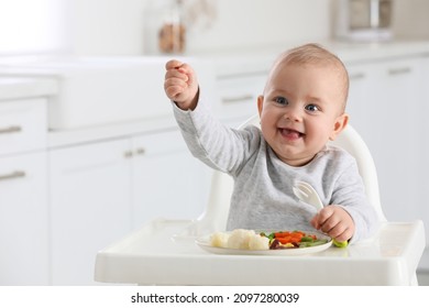 Cute little baby eating healthy food at home. Space for text - Powered by Shutterstock