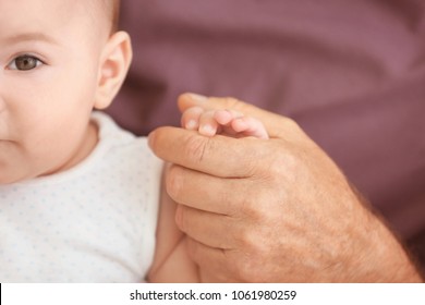 Cute little baby with grandfather, closeup - Shutterstock ID 1061980259