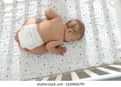 Cute Little Baby Sleeping In Crib, Top View