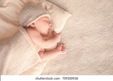 Cute little baby sleeping on bed at home - Shutterstock ID 709200928