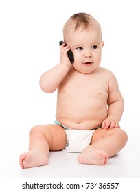 Cute little baby is talking on cell phone, isolated over white