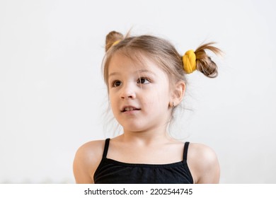 Cute, Little, Blonde Girl With Pigtails Looking At Someone, Smiling