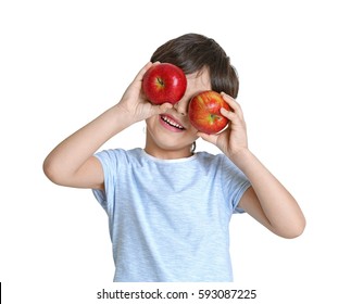 Cute little boy with apples on white background
