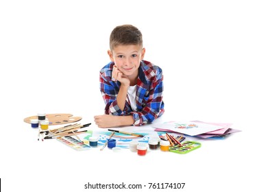 Cute Little Boy With Art Supplies On White Background