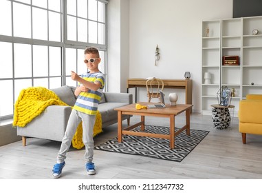 Cute Little Boy Dancing At Home