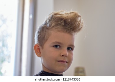 Cute Little Boy With Hairstyle, Sitting At Home. Weird Haircut Made By Mom