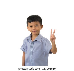 Cute Little Boy Holding Up The Peace Sign