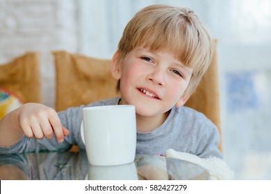 476 A child holding a big cup Images, Stock Photos & Vectors | Shutterstock