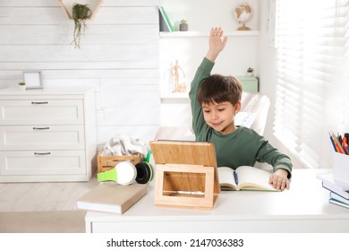 Cute little boy with modern tablet studying online at home, space for text. E-learning - Powered by Shutterstock