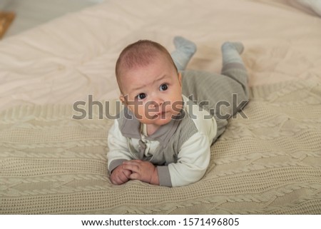 Similar – Image, Stock Photo The little boy are laying at the hammock and happy