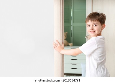 Cute Little Boy Opening Bedroom Door