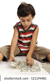 Cute Little Boy Plays With Money