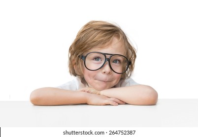 Cute little boy with toy glasses isolated on white background  
