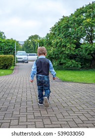 Cute Little Boy Walking Away