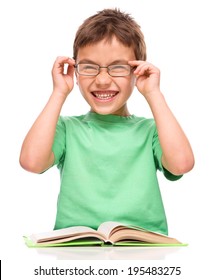 Cute Little Boy Is Wearing Glasses, Isolated Over White