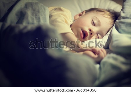 Similar – Baby asleep while parents caress