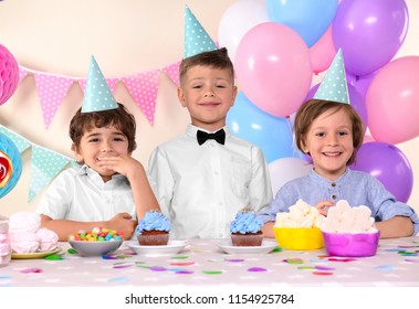 Cute Little Boys Celebrating Birthday At Home