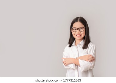 Cute Little Businesswoman On Grey Background