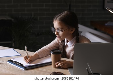 Cute Little Businesswoman Working In Office At Night