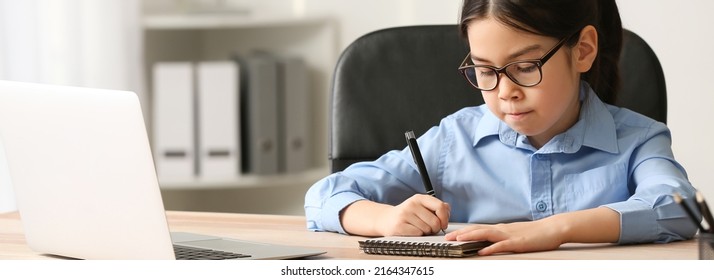 Cute Little Businesswoman Working In Office