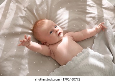 Cute Little Child Lying In Cot, Above View. Healthy Baby